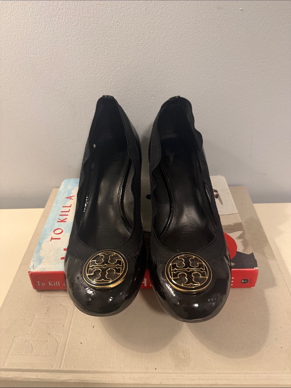 Tory Burch Black Patent Leather Round-Toe Heels with Gold Logo Medallion